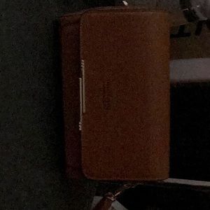 Med size bag dark brown cross body front pocket excellent condition